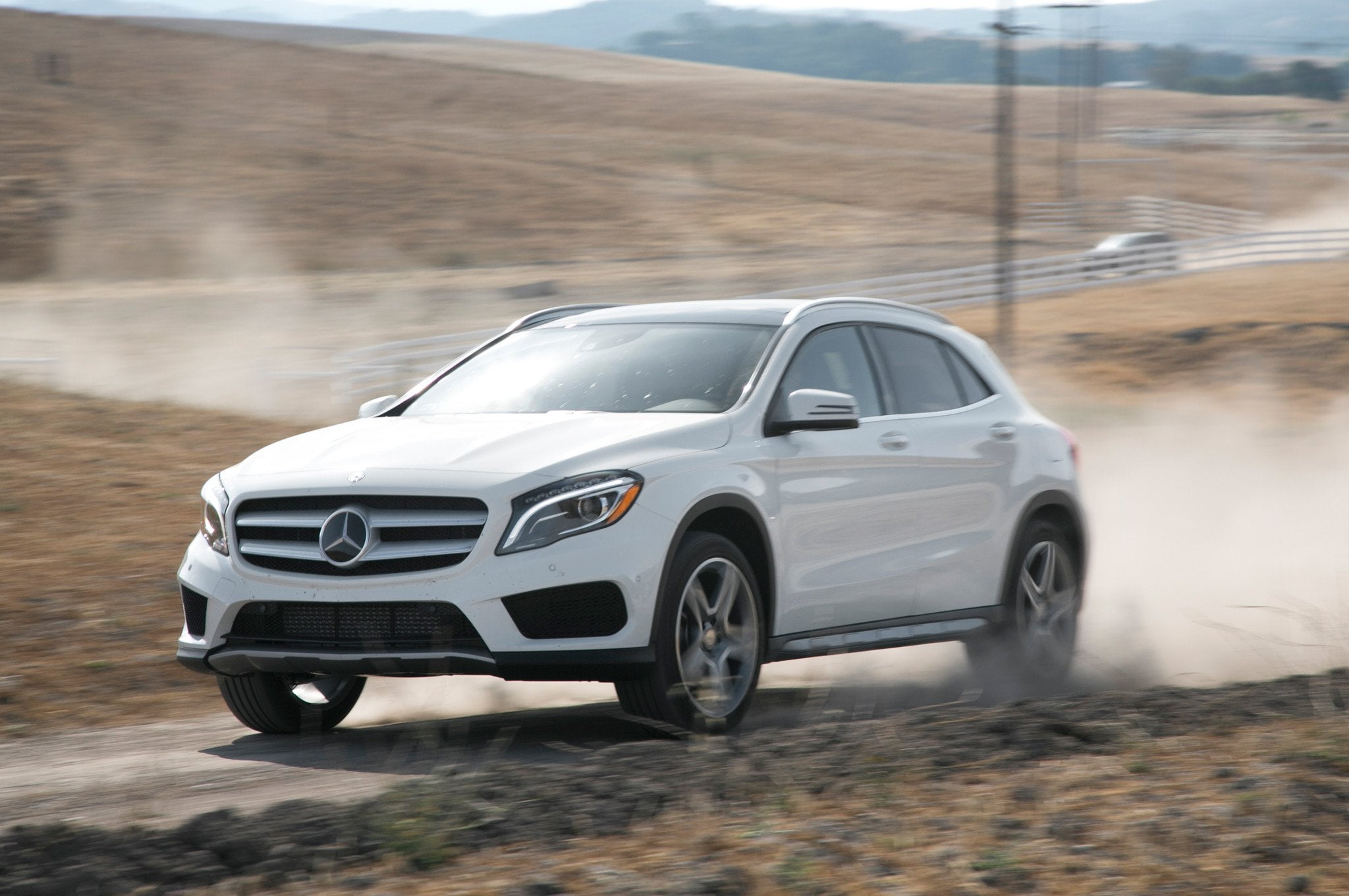 2015 Mercedes Benz GLA250 4Matic front three quarters in motion
